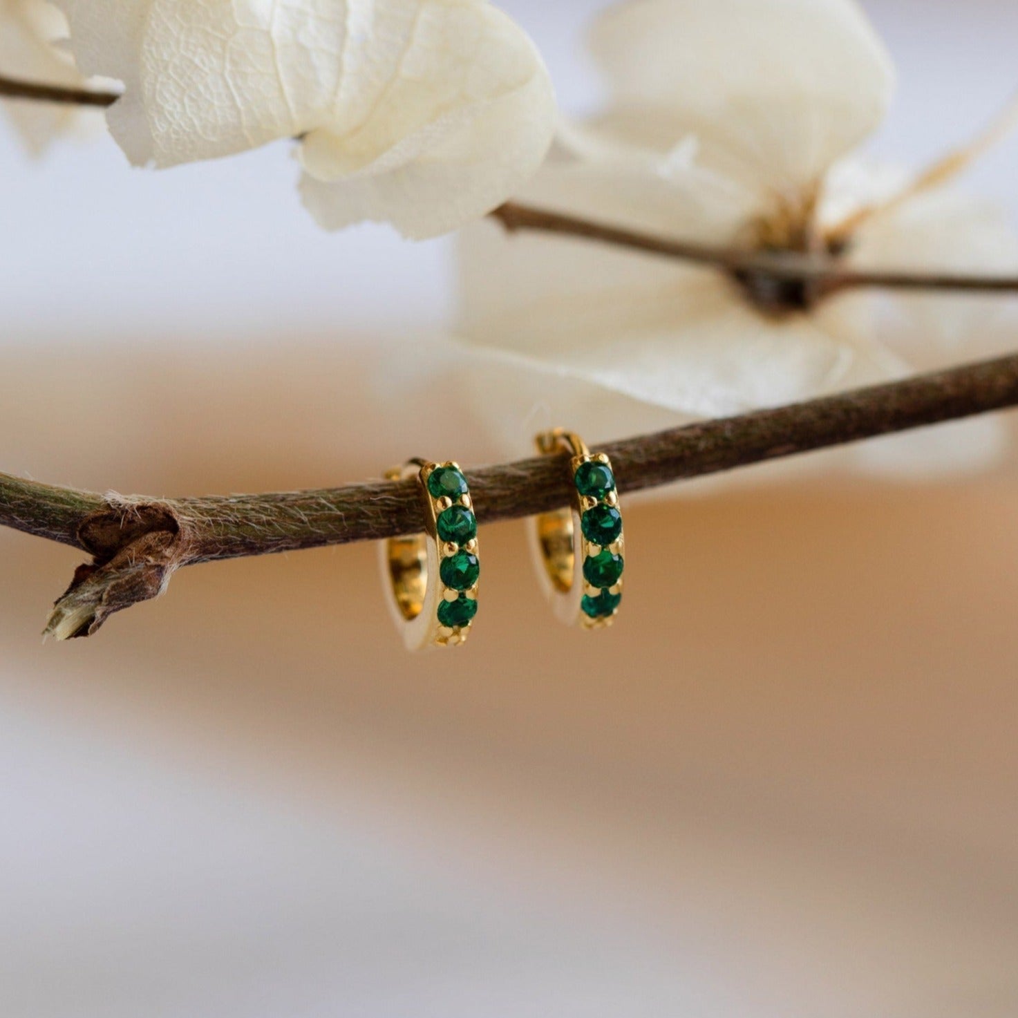 Emerald Huggie Hoops: Timeless Elegance in Stunning Green